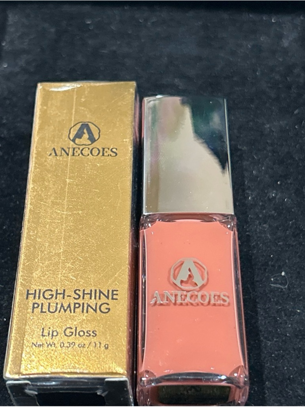 Anecoes lip gloss shade 201 pink grapefruit
